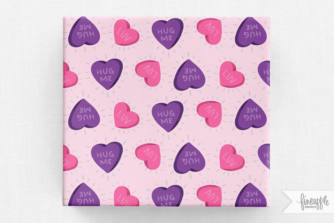 A pink and purple wrapping paper with lovelies pattern - hearts on a gray background.
