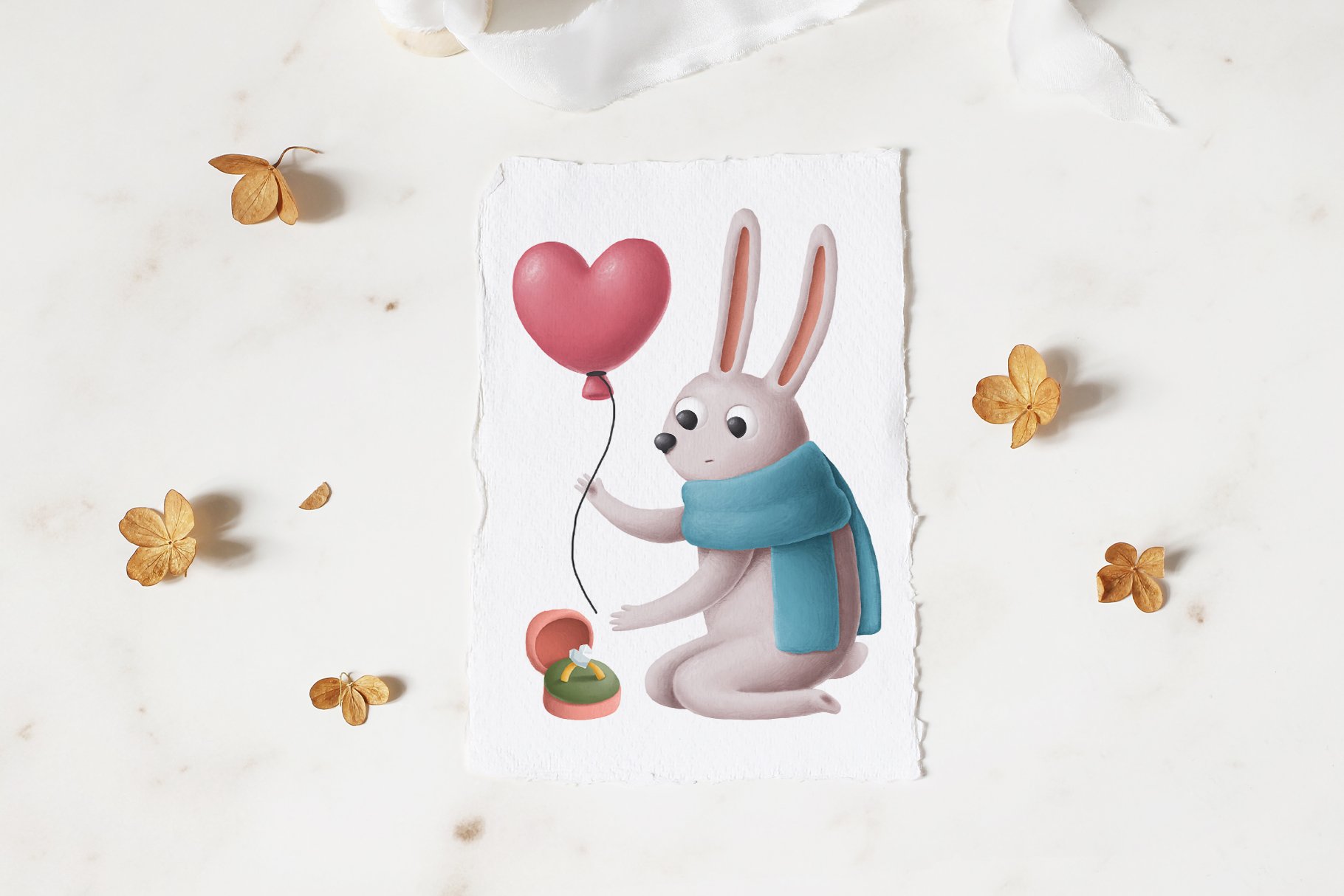 White piece of paper with the cute rabbit and balloon in a heart shape.