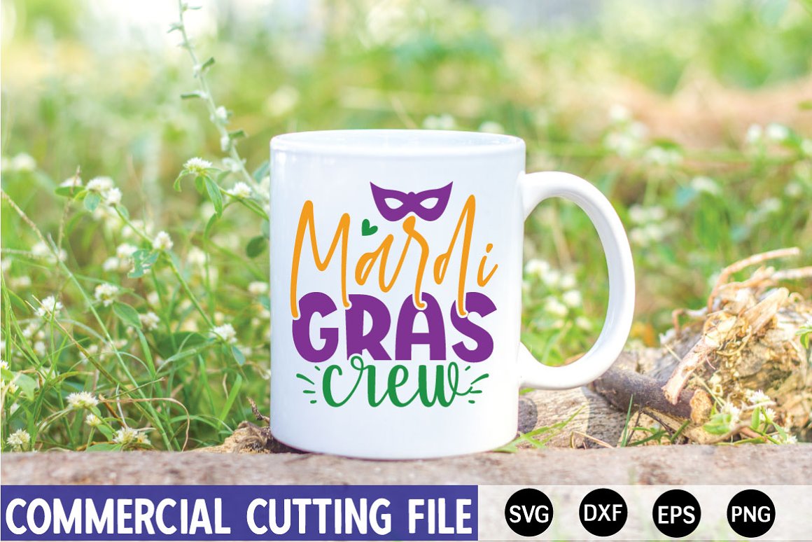 Big white tea cup with a Mardi gras graphic.