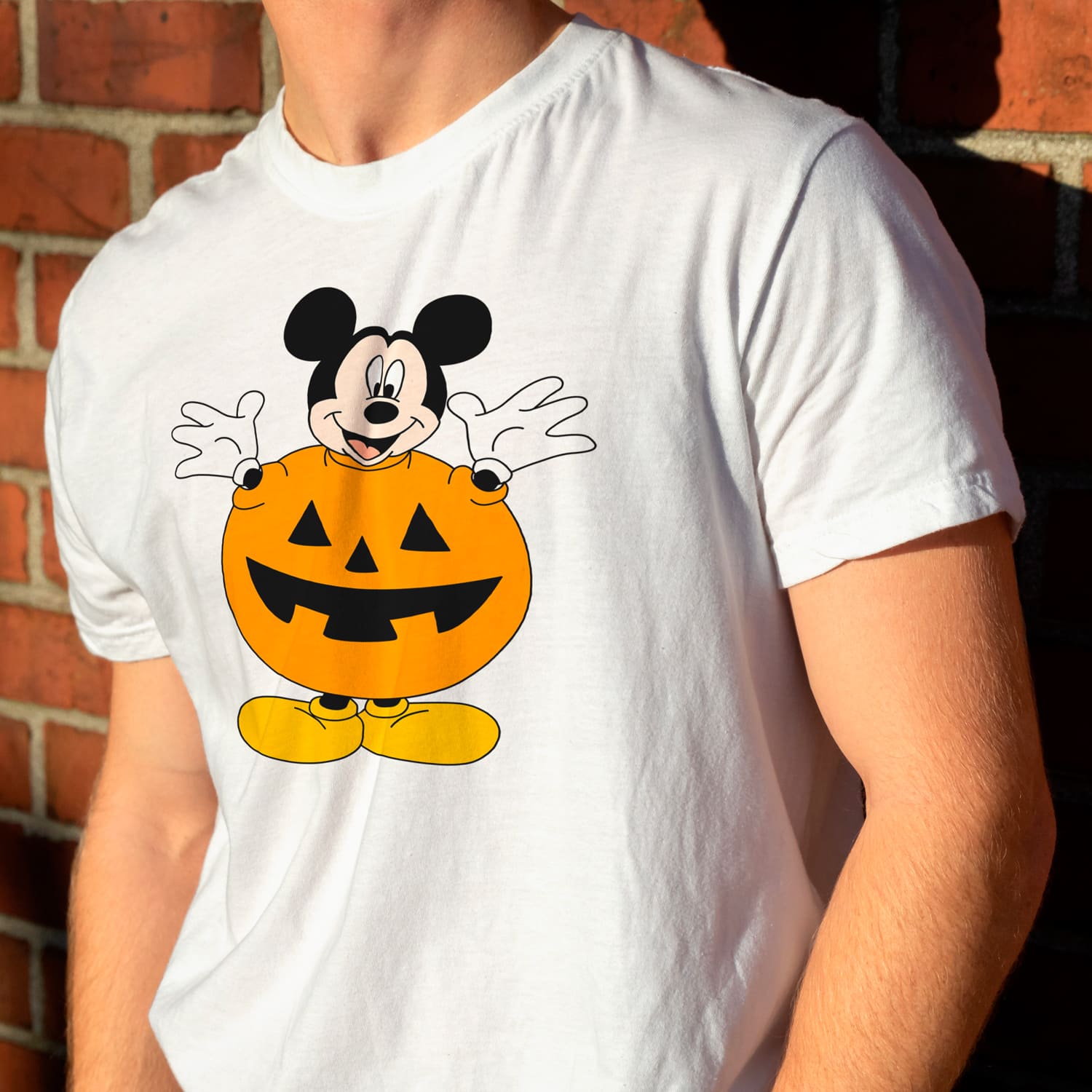 White t-shirt design with Mickey Mouse Halloween image.
