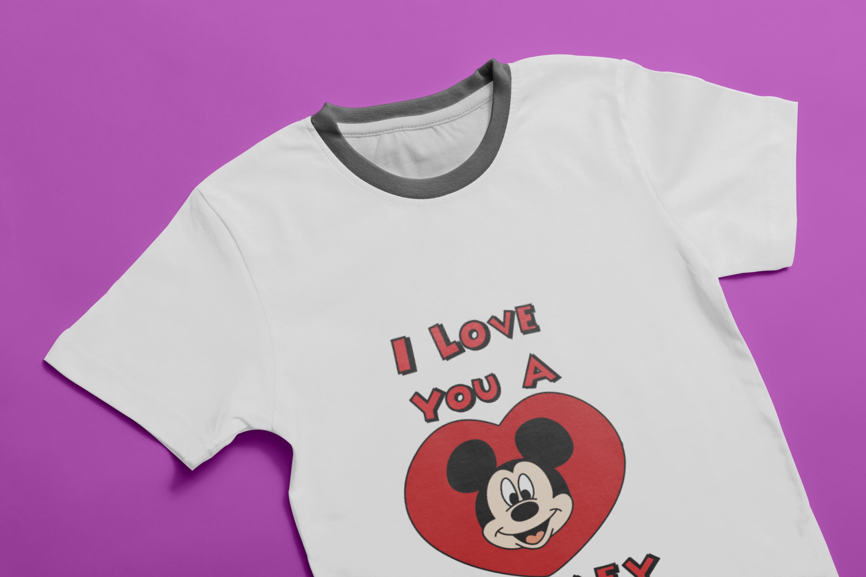 White t-shirt with the cute Mickey mouse face in a heart.