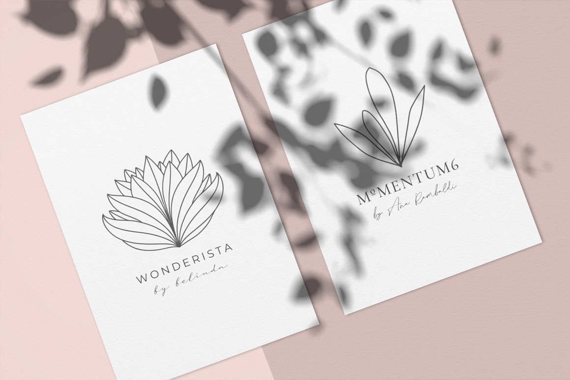2 white cards with black line art logos "Wonderista" and "M Mentum6" on a pink background.