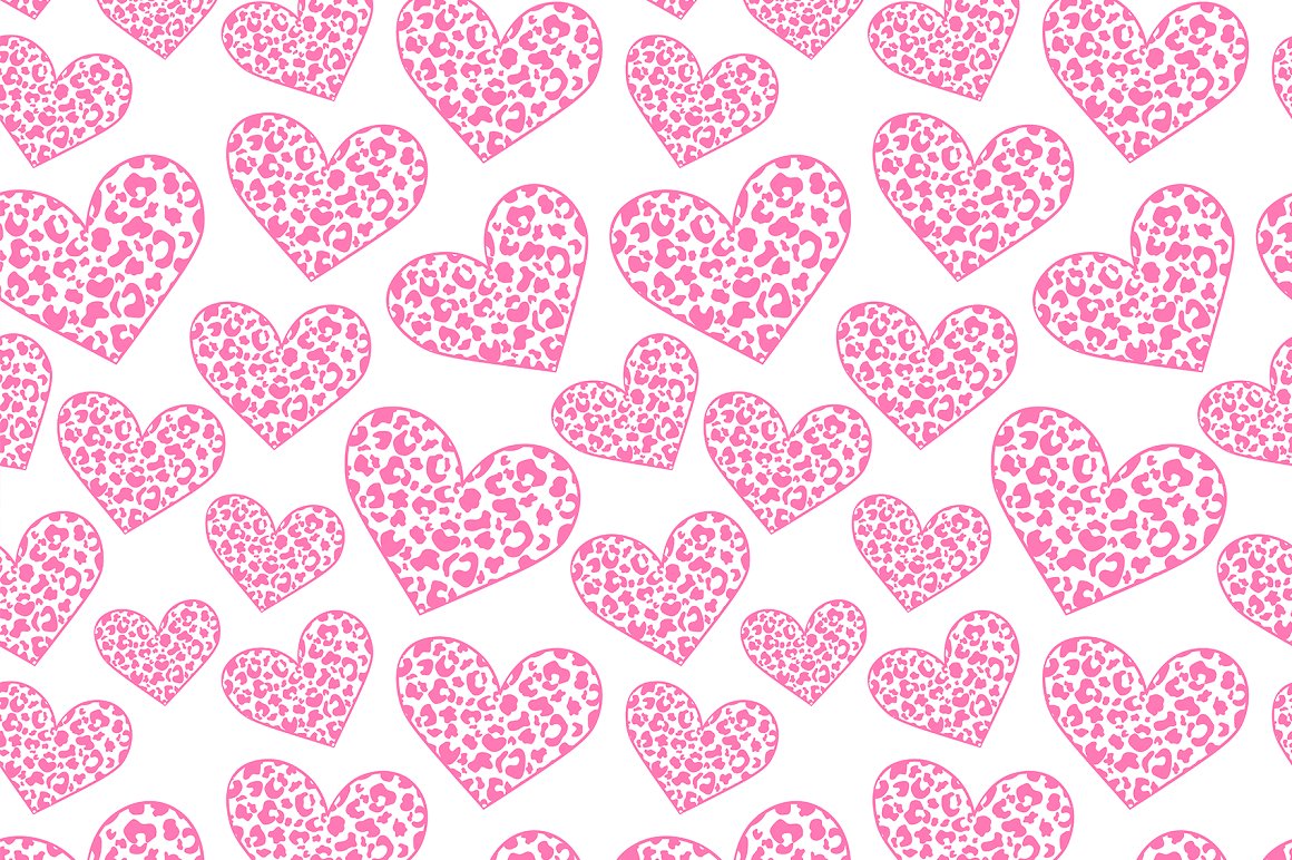 Seamless pattern with pink hearts with a leopard ornament on a white background.