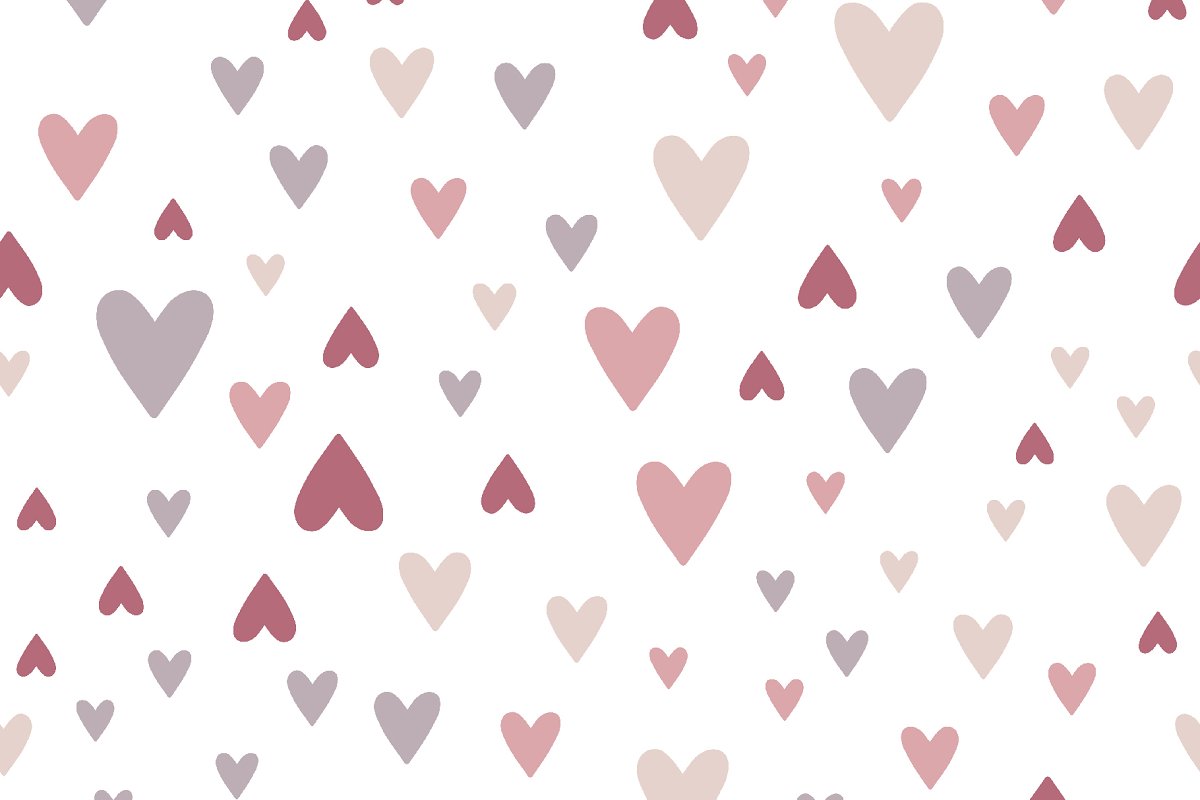 Small colorful hearts on the light background.