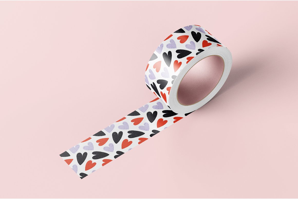Roll of decorative tape with illustrations of black, red and gray hearts.