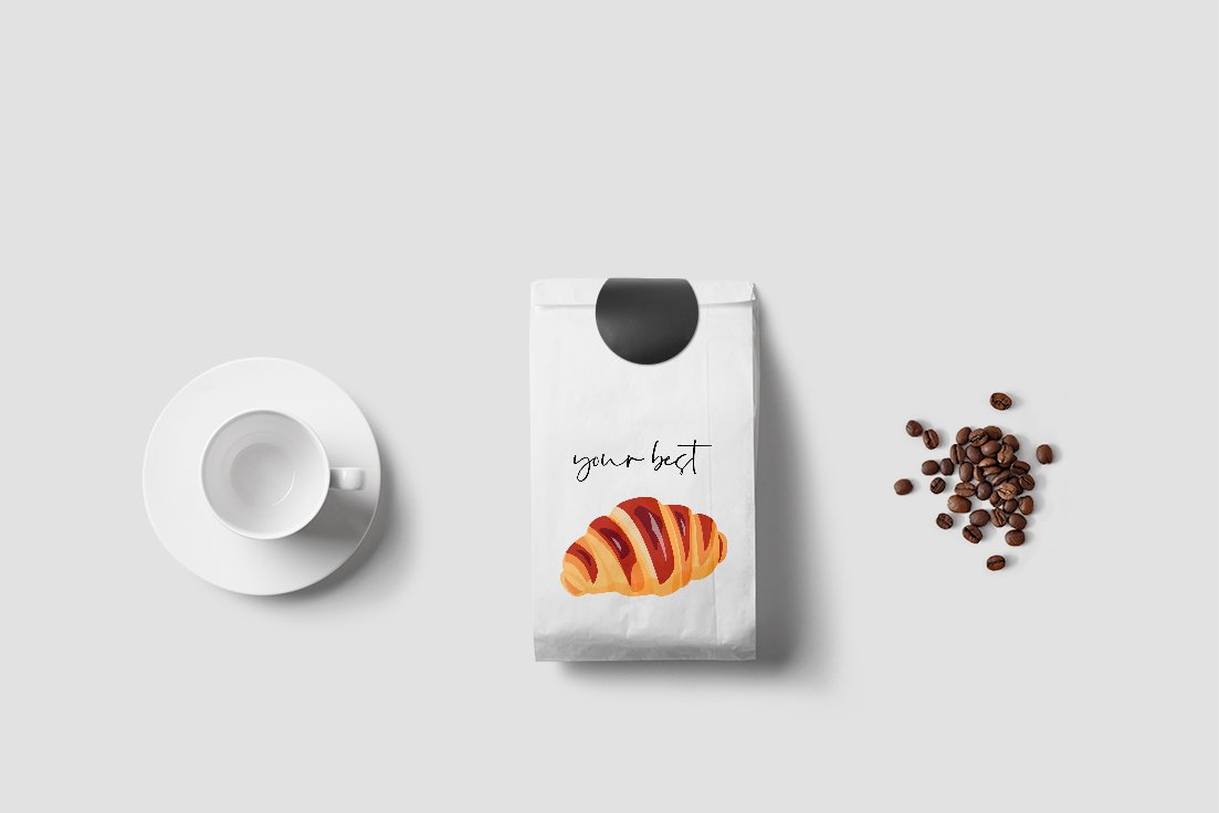White packaging with black lettering "Your best" and illustration of a croissant on a gray background.