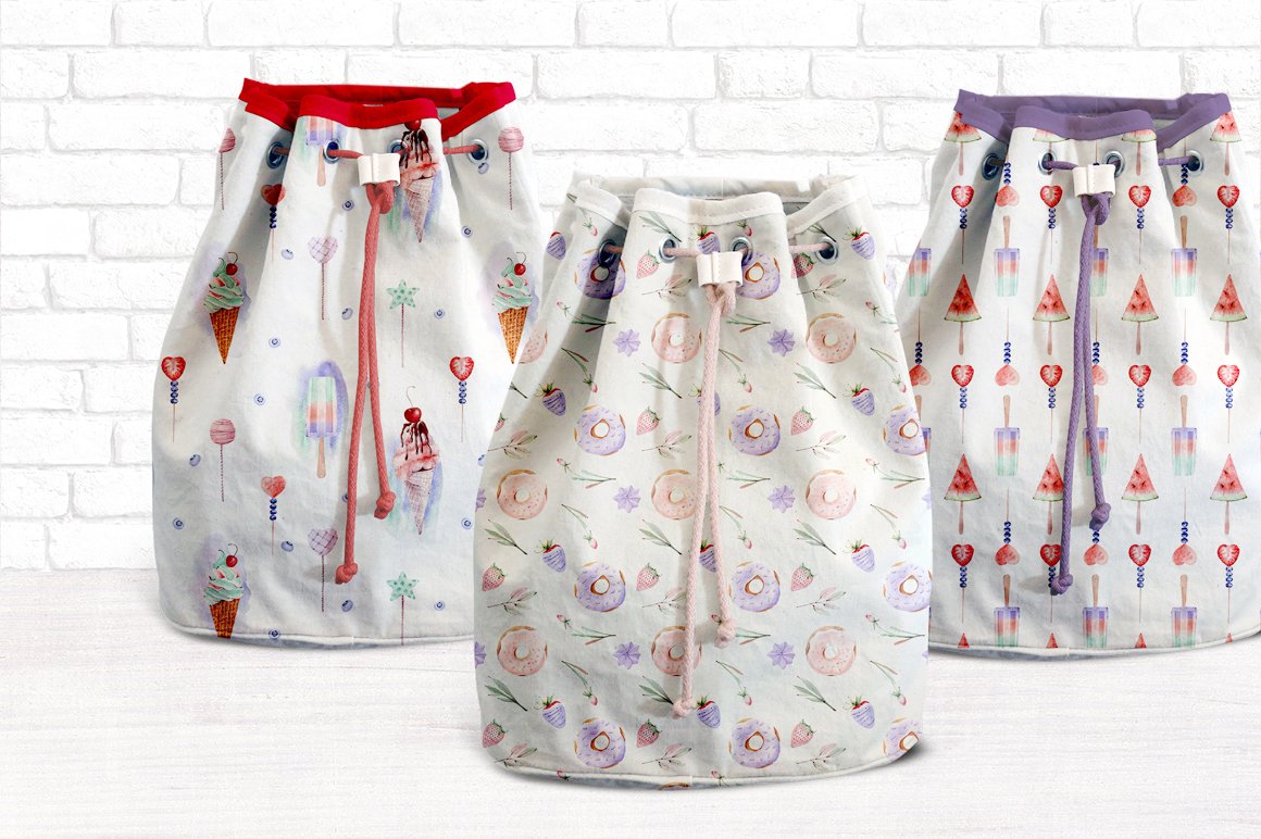 A set of 2 white bags with red, white and purple edgings and sweet and floral illustrations.
