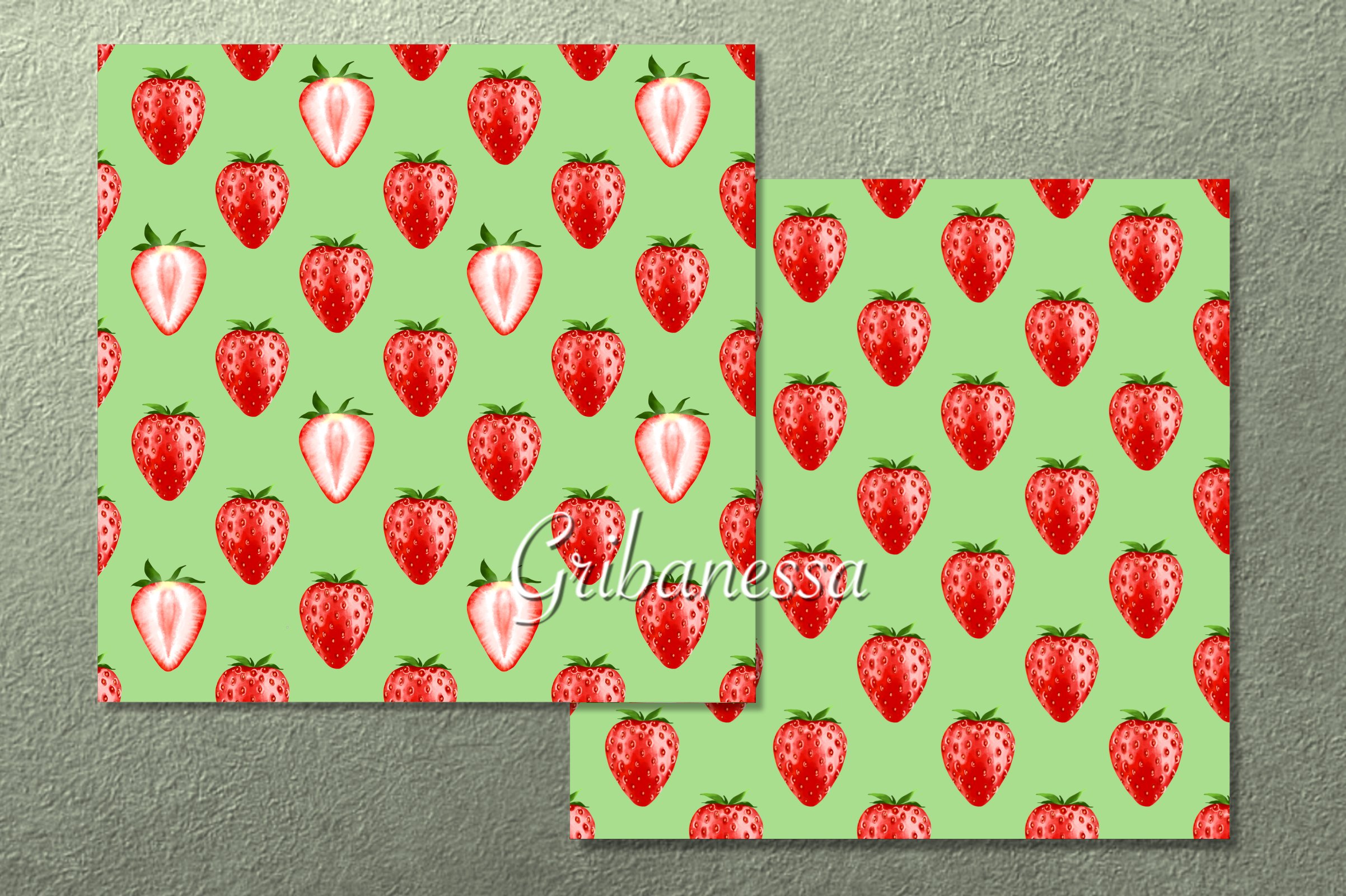 A set of 2 different green patterns with strawberries.