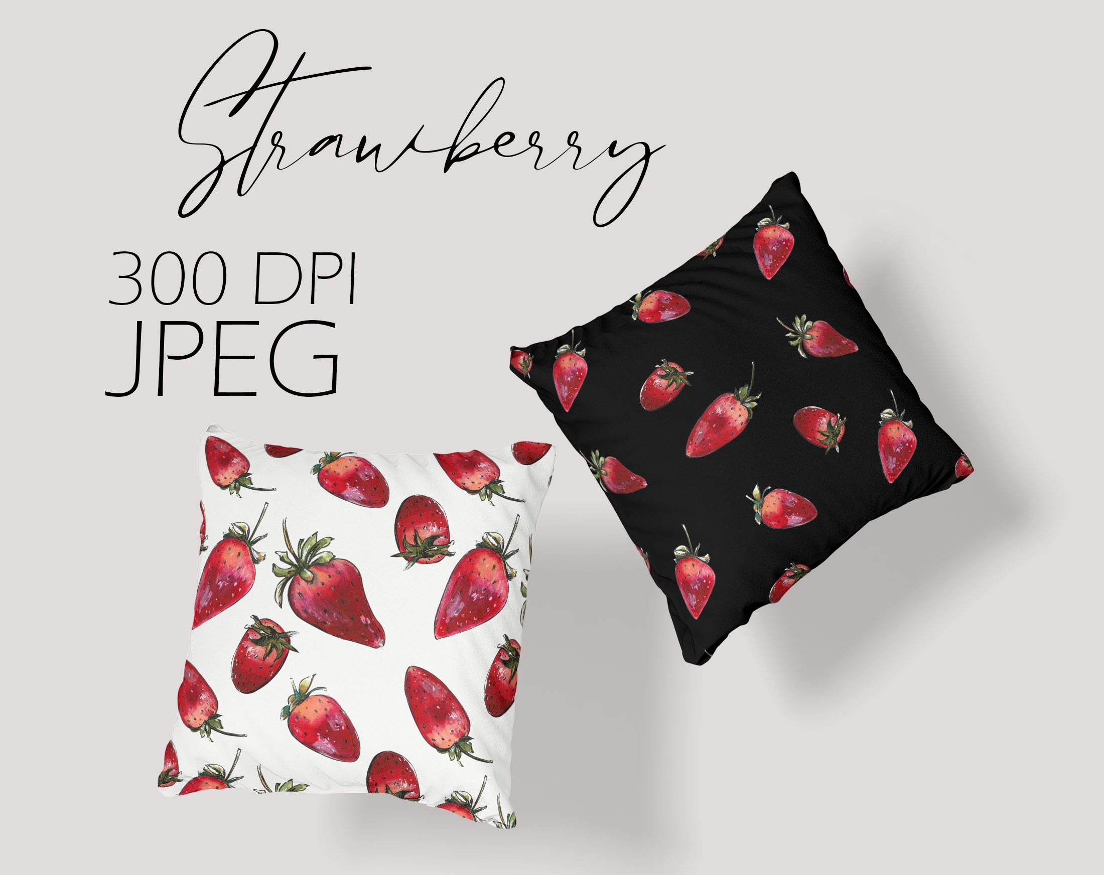 White pillow and black pillow with illustrations of a strawberries on a gray background.
