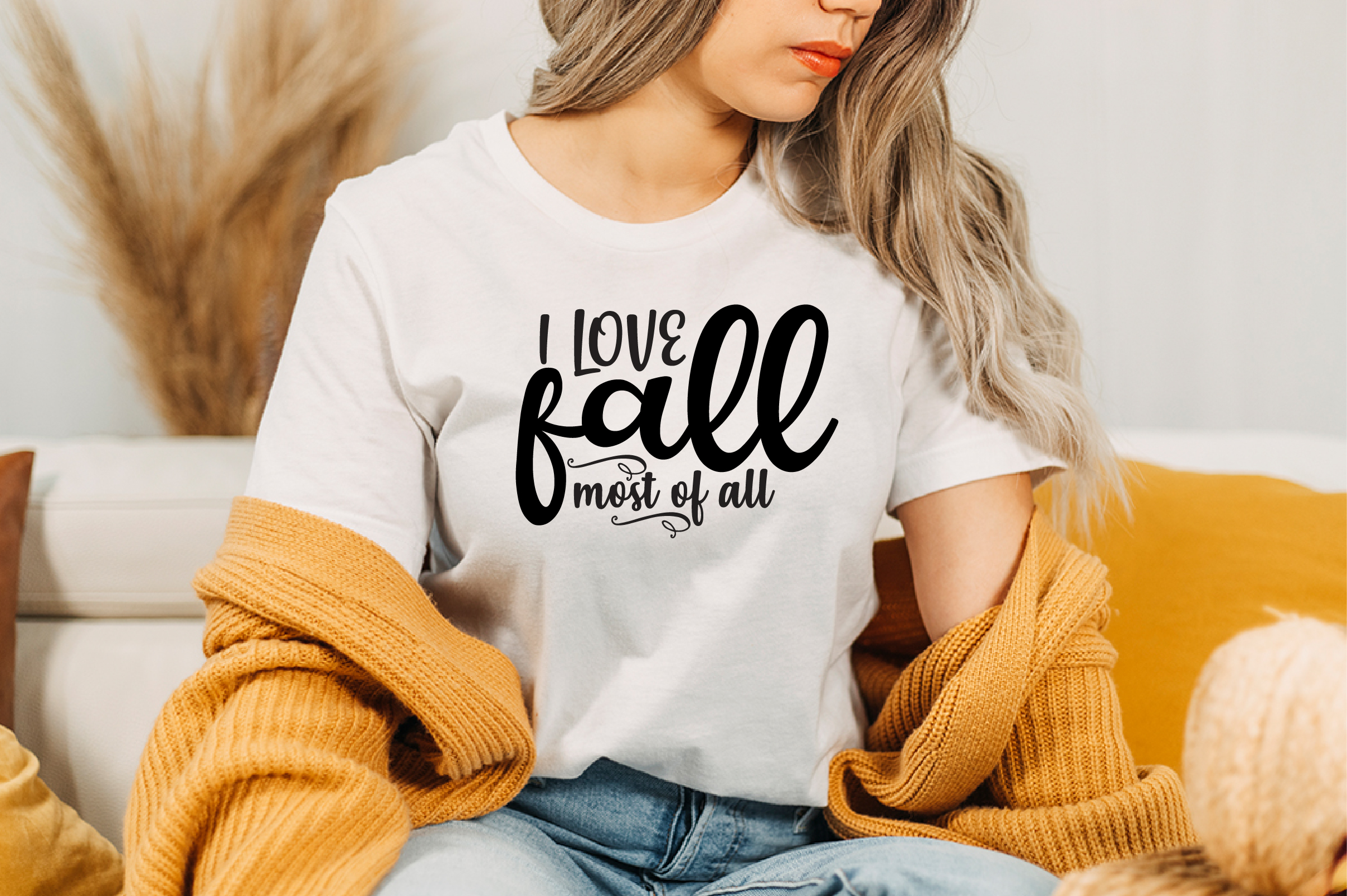 Image of white t-shirt with gorgeous black lettering i love fall most of all.