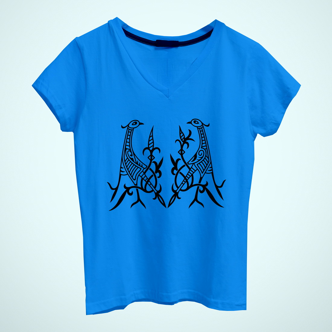 Blue t - shirt with two birds on it.