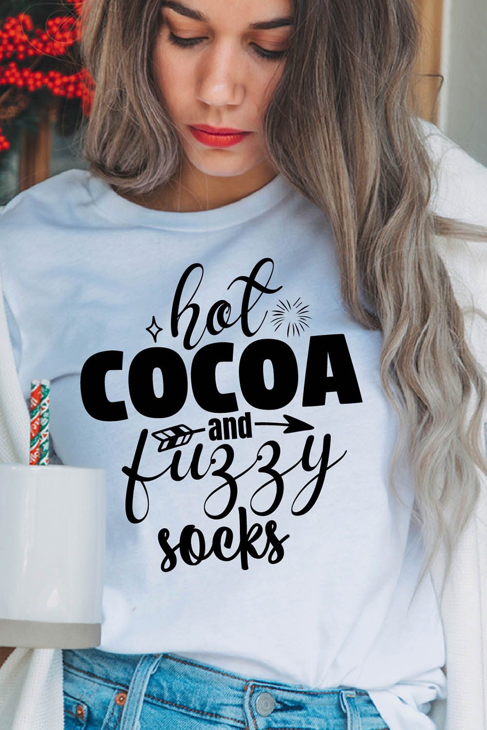 Image of a girl in a white T-shirt with a wonderful inscription "hot cocoa and fluffy socks".