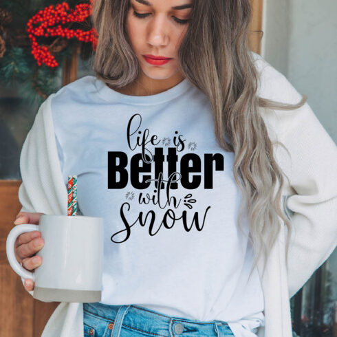 Image of a girl in a white t-shirt with an amazing inscription "life is better with snow".