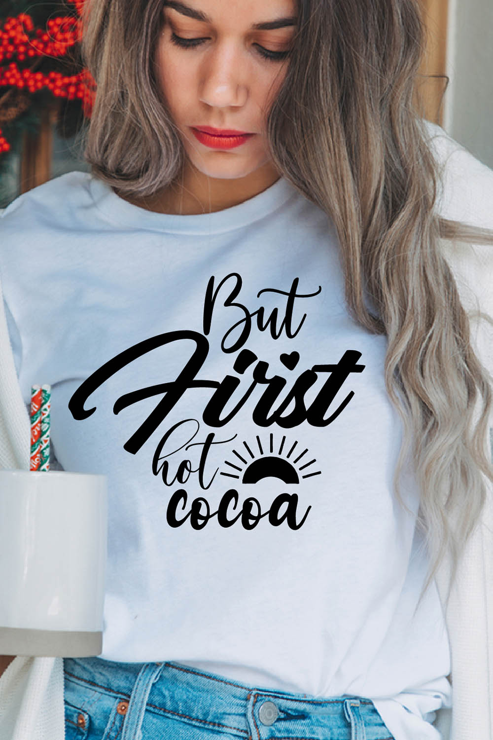 Image of a girl in a white t-shirt with a unique slogan "But first hot cocoa".