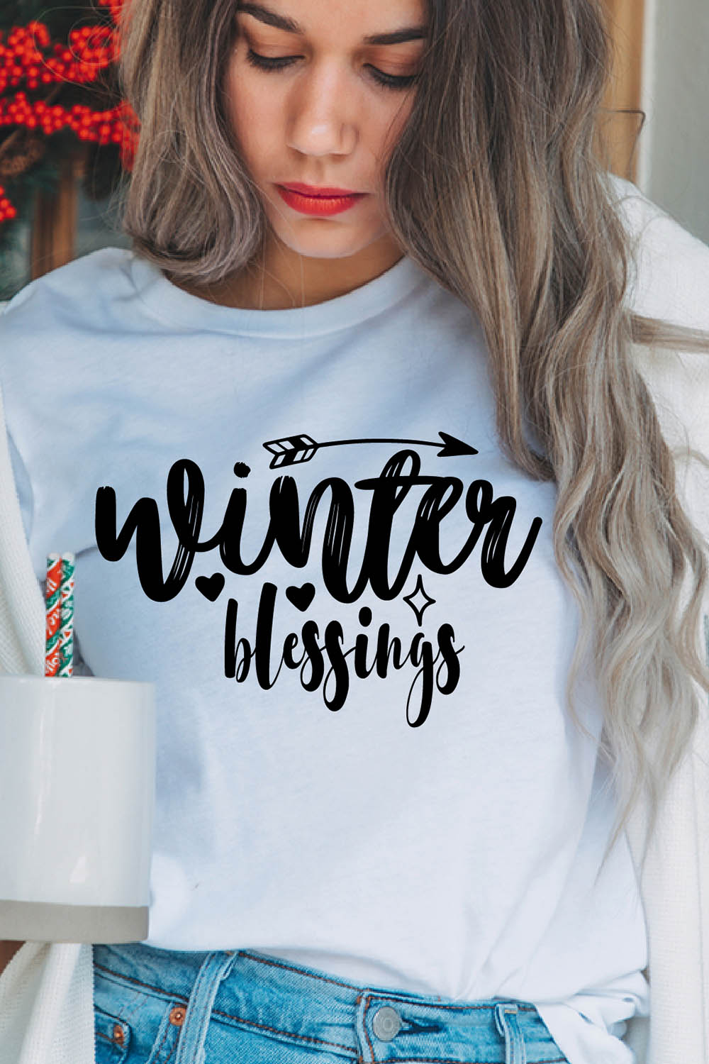 Image of a girl in a white t-shirt with a beautiful inscription "winter blessings".