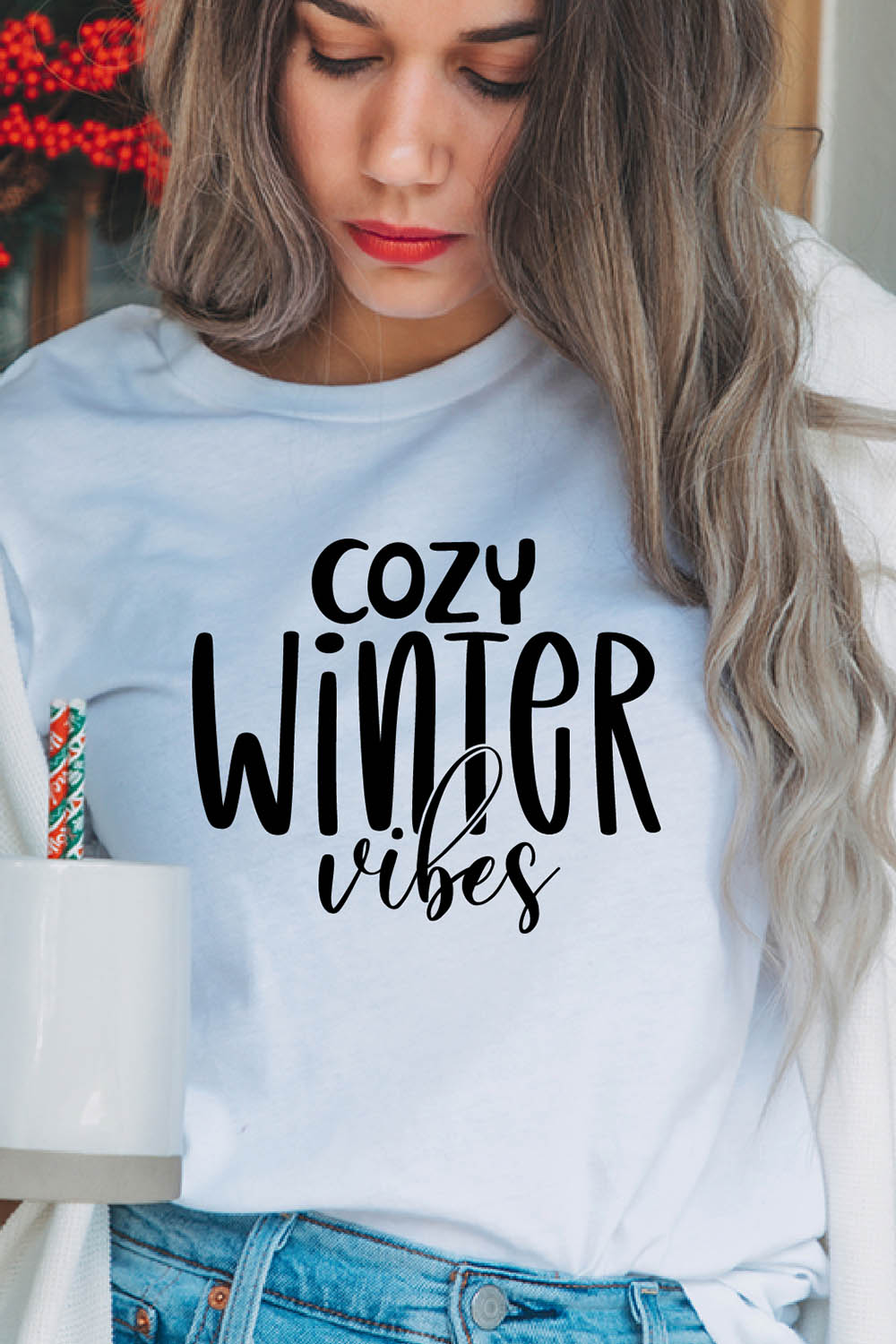 Image of a girl in a white t-shirt with a gorgeous inscription "cozy winter vibes".