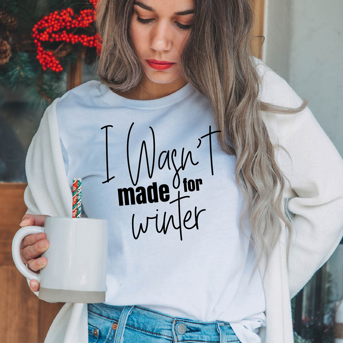 Image of a girl in a white T-shirt with a wonderful inscription "I wasnt made for winter".