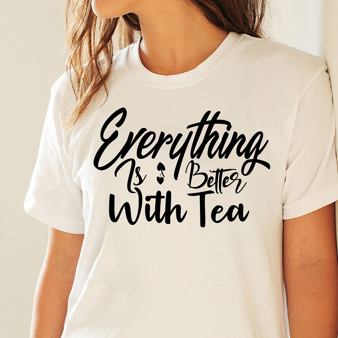 Image of a white t-shirt with a great slogan Everything Is Better With Tea.