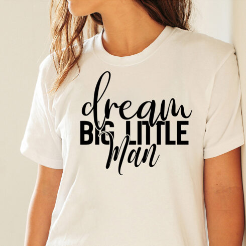 Image of a white t-shirt with a beautiful black inscription Dream Big Little Man.
