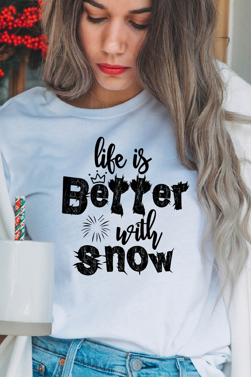 Image of a girl in a white t-shirt with an elegant inscription "life is better with snow".