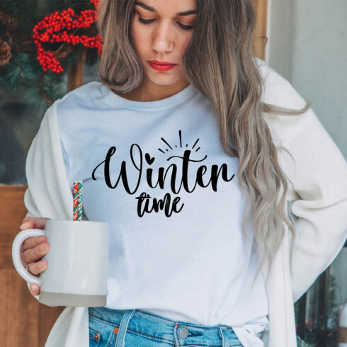 Image of a girl in a white T-shirt with a charming inscription "winter time".