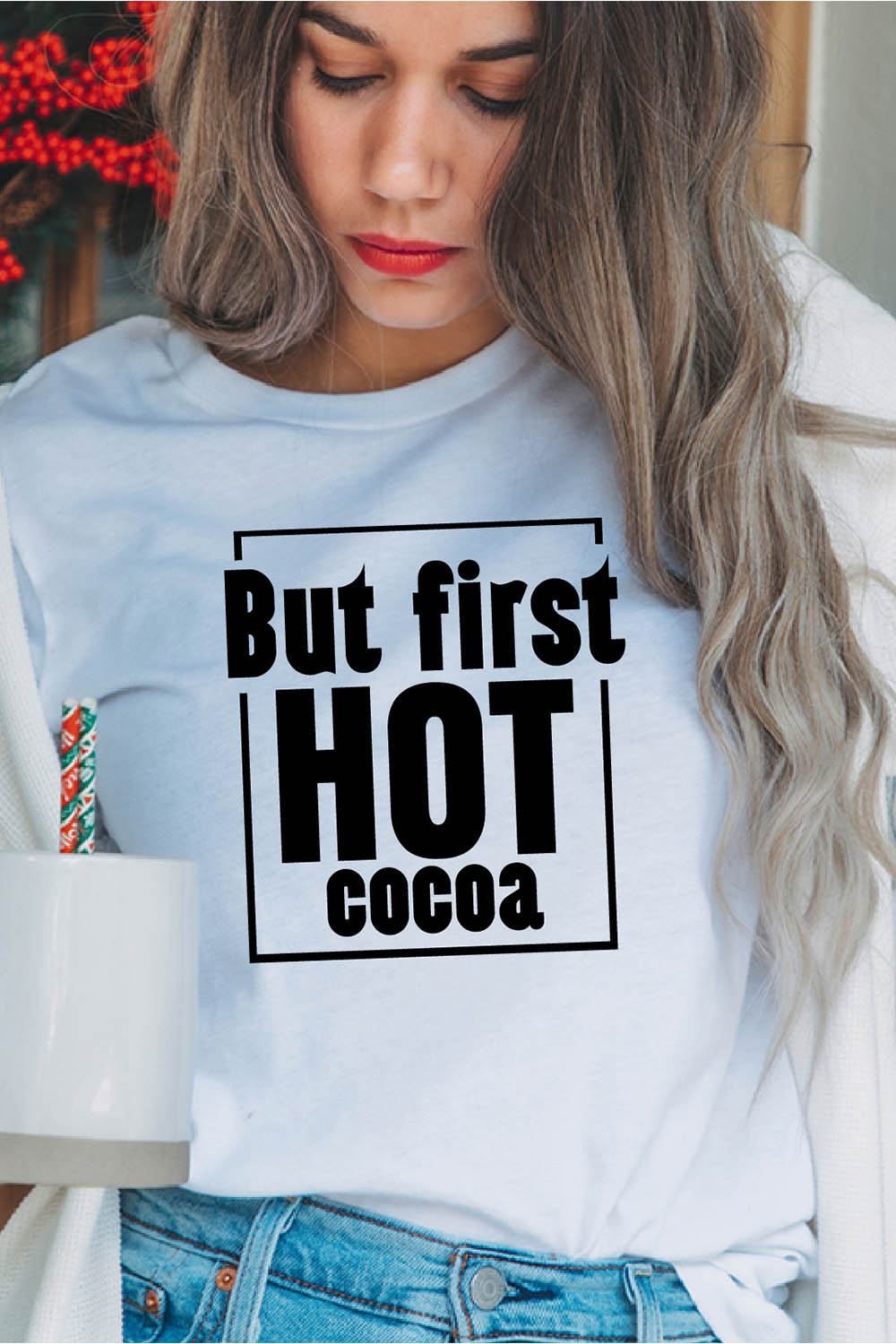 Image of a girl in a white T-shirt with an enchanting inscription "But first hot cocoa".