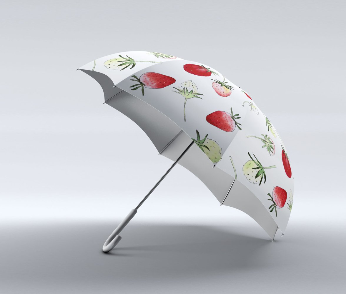 Cute umbrella with strawberries.
