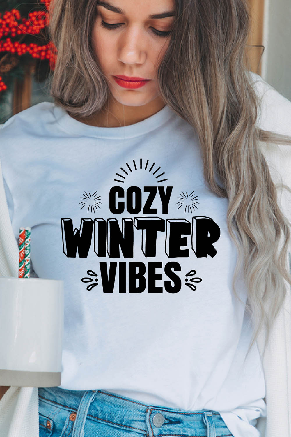 Image of a girl in a white t-shirt with a charming inscription "cozy winter vibes".