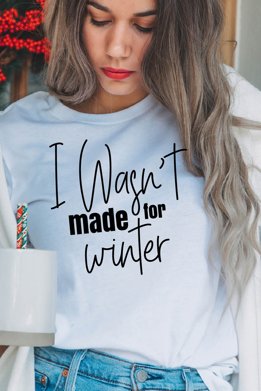 Image of a girl in a white T-shirt with an irresistible inscription "I wasnt made for winter".