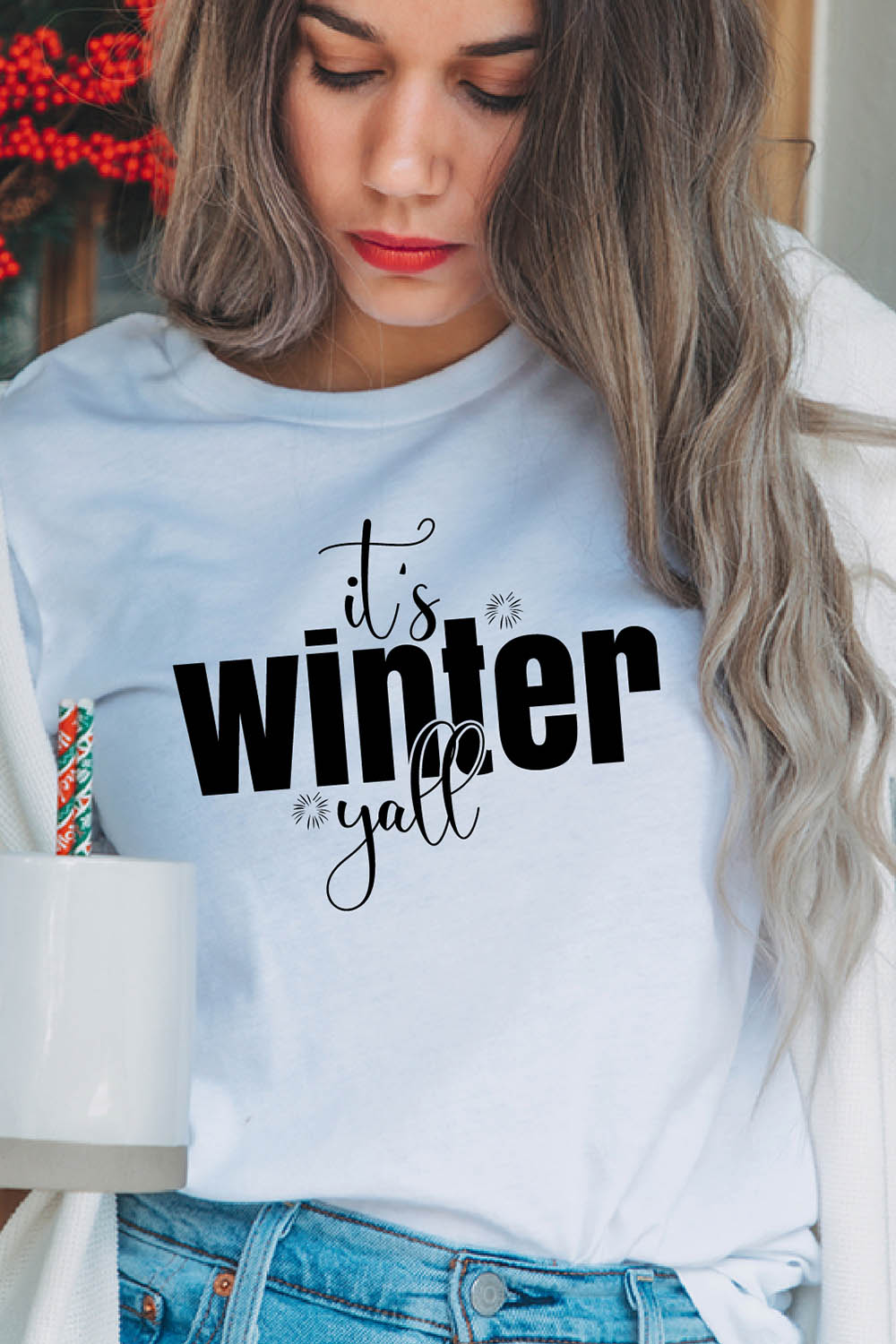 Image of a girl in a white t-shirt with the enchanting inscription "Its Winter Yall".