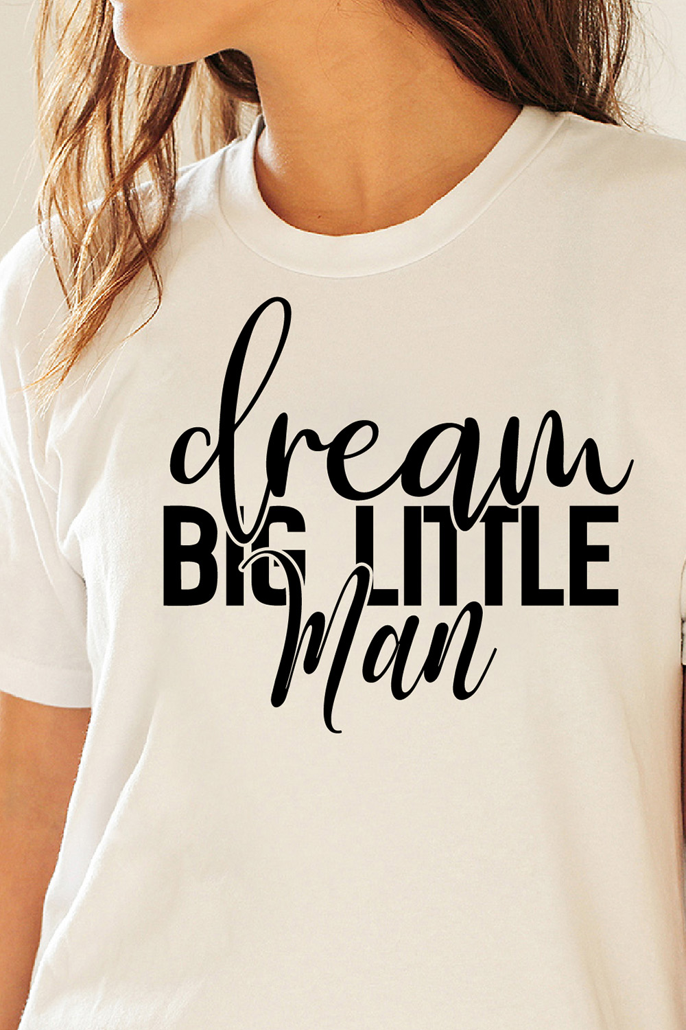 Image of a white t-shirt with a wonderful black inscription Dream Big Little Man.