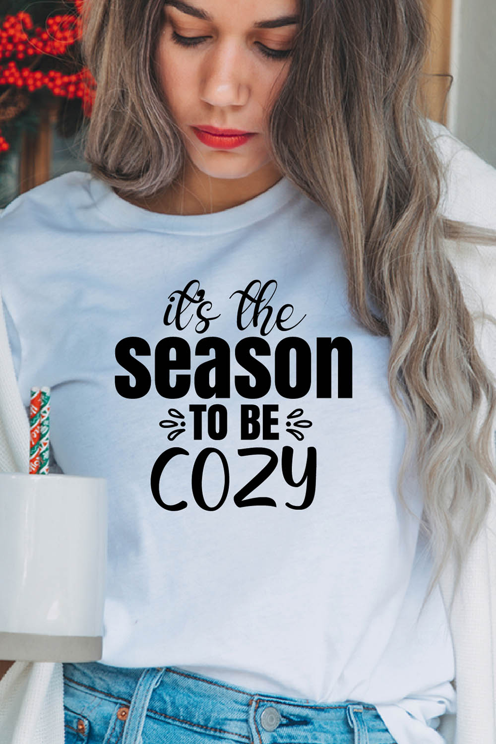 Image of a girl in a white t-shirt with an amazing inscription "Its The Season To Be Cozy".