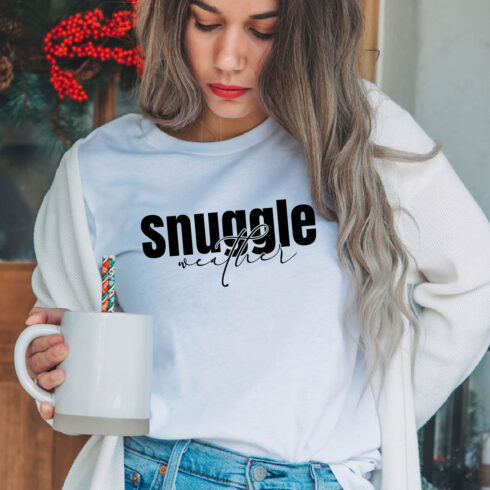 Image of a girl in a white t-shirt with an elegant inscription "Snuggle weather ".