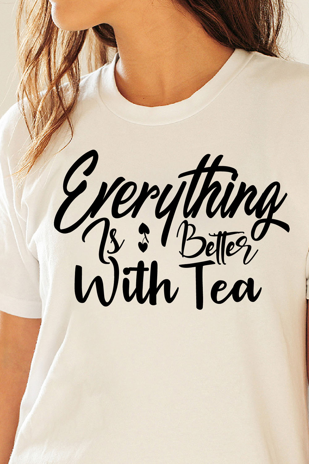 Image of a white t-shirt with a charming slogan Everything Is Better With Tea.