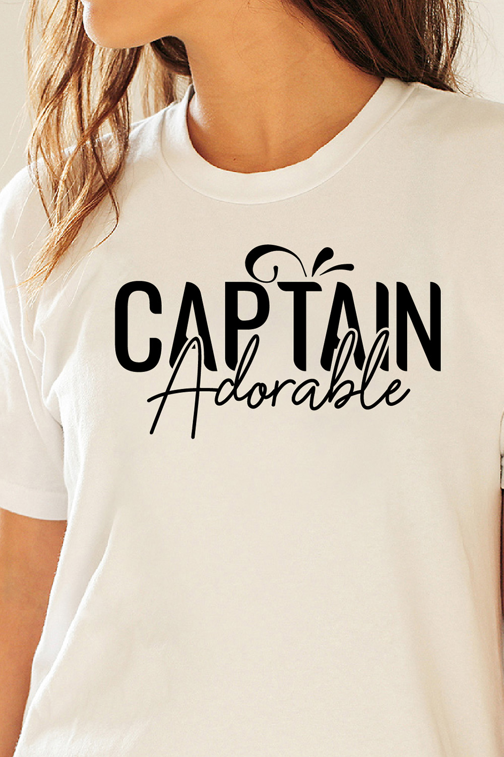 Image of a white t-shirt with a beautiful black inscription Captain Adorable.