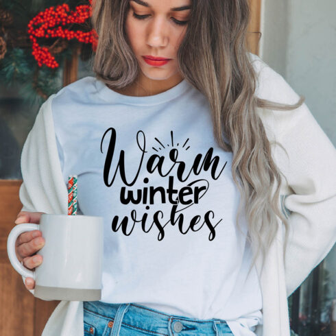 Image of a girl in a white t-shirt with an exquisite inscription "Warm winter wishes".