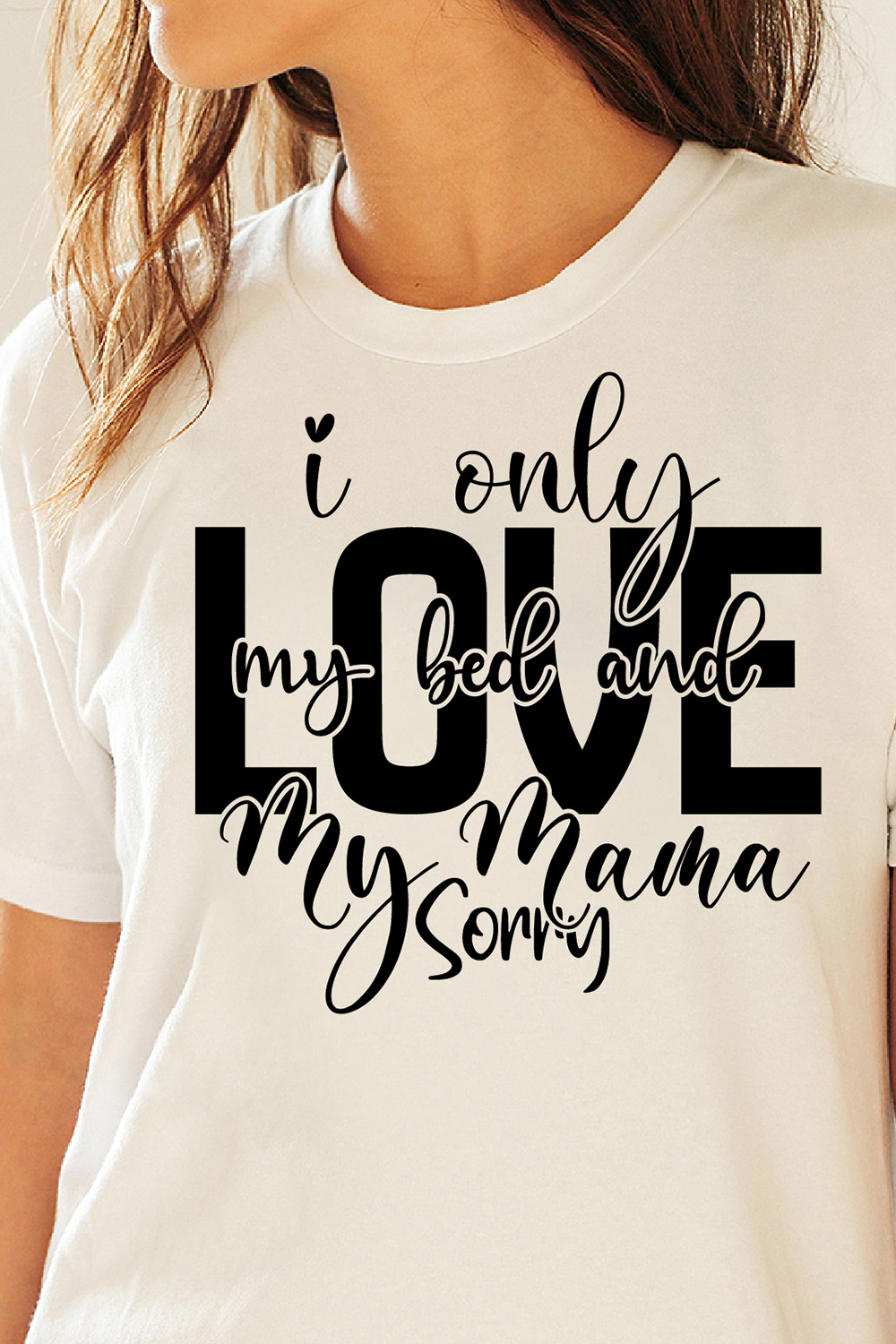 Image of a white t-shirt with irresistible black slogan I Only Love My Bed And My Mama Sorry.