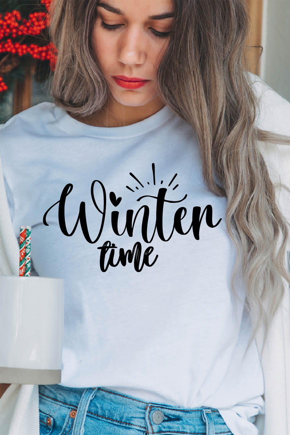 Image of a girl in a white T-shirt with a beautiful inscription "winter time".