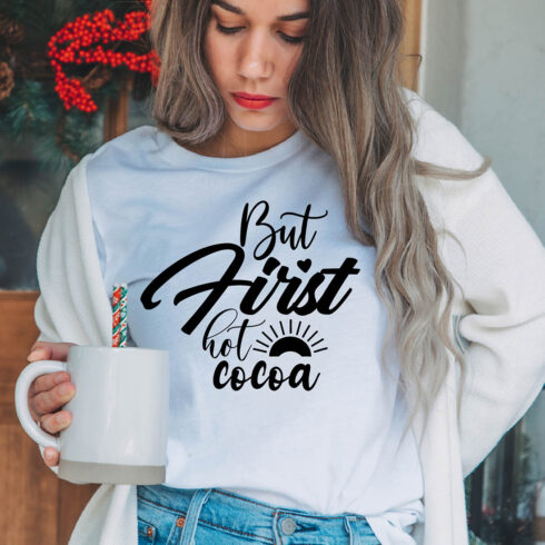 Image of a girl in a white t-shirt with an amazing inscription "But first hot cocoa".