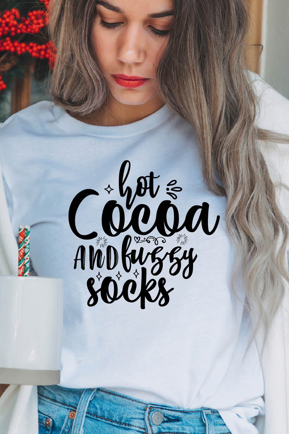 Image of a girl in a white T-shirt with a wonderful inscription "Hot Cocoa And Fuzzy Socks".