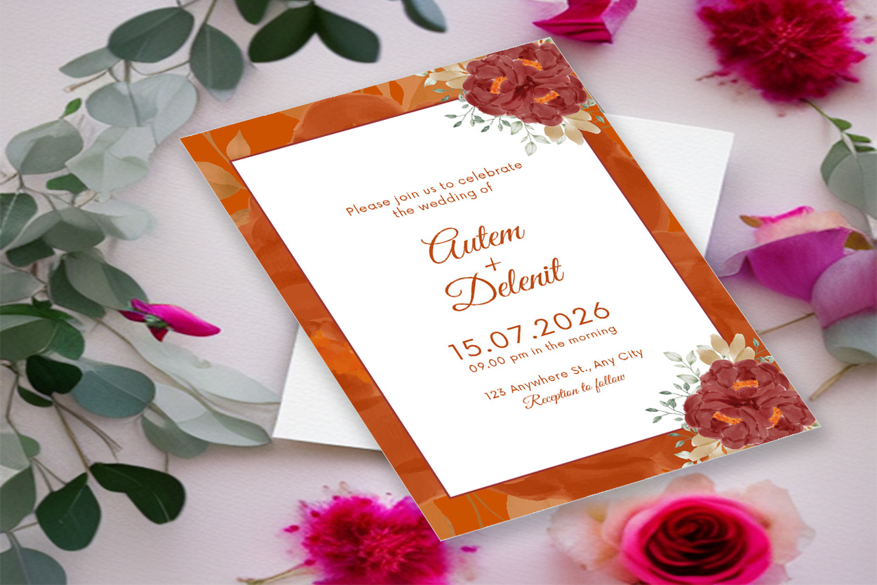 Image of an elegant wedding invitation with flowers.