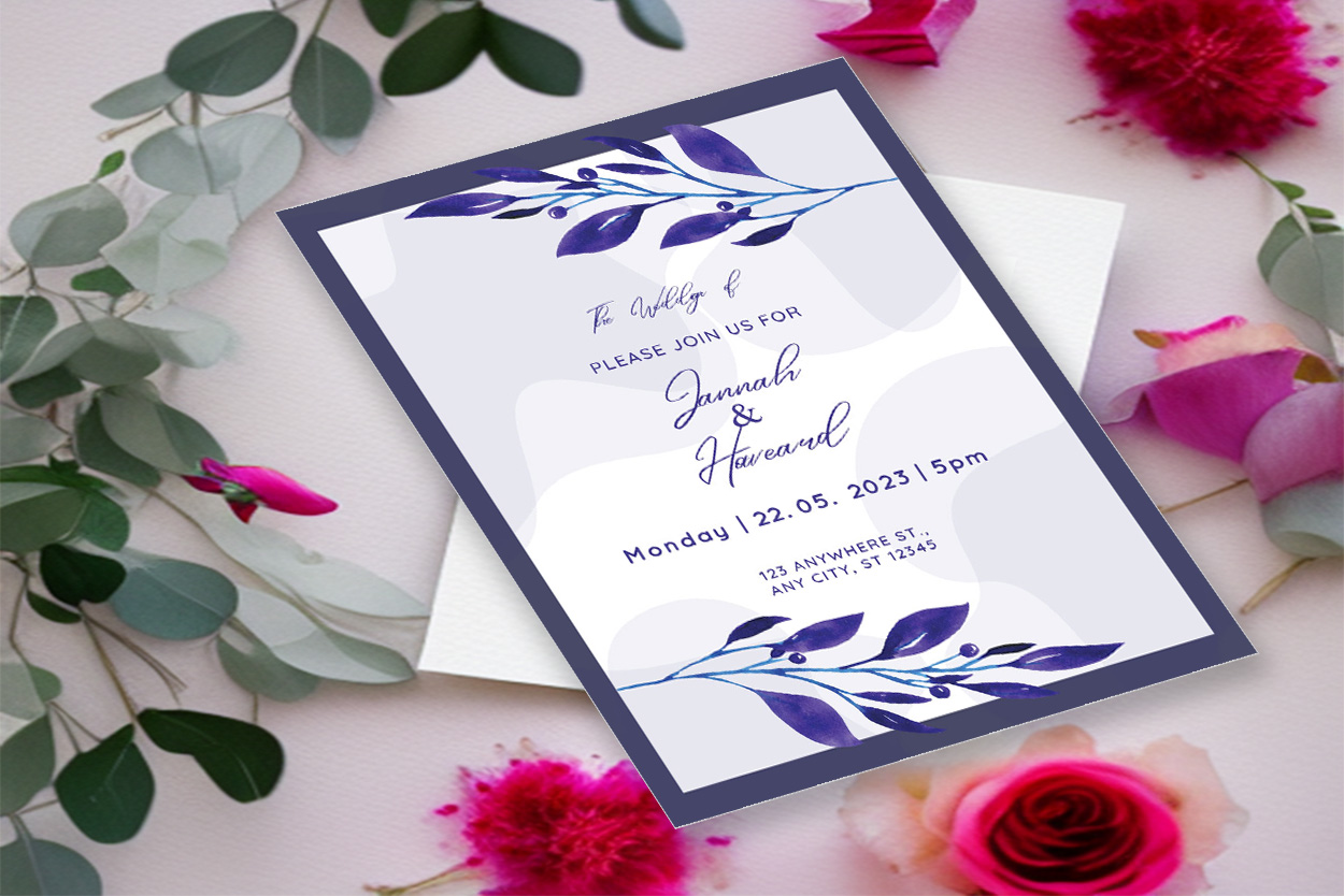 Image with amazing wedding invitation card in blue tones and leaves.