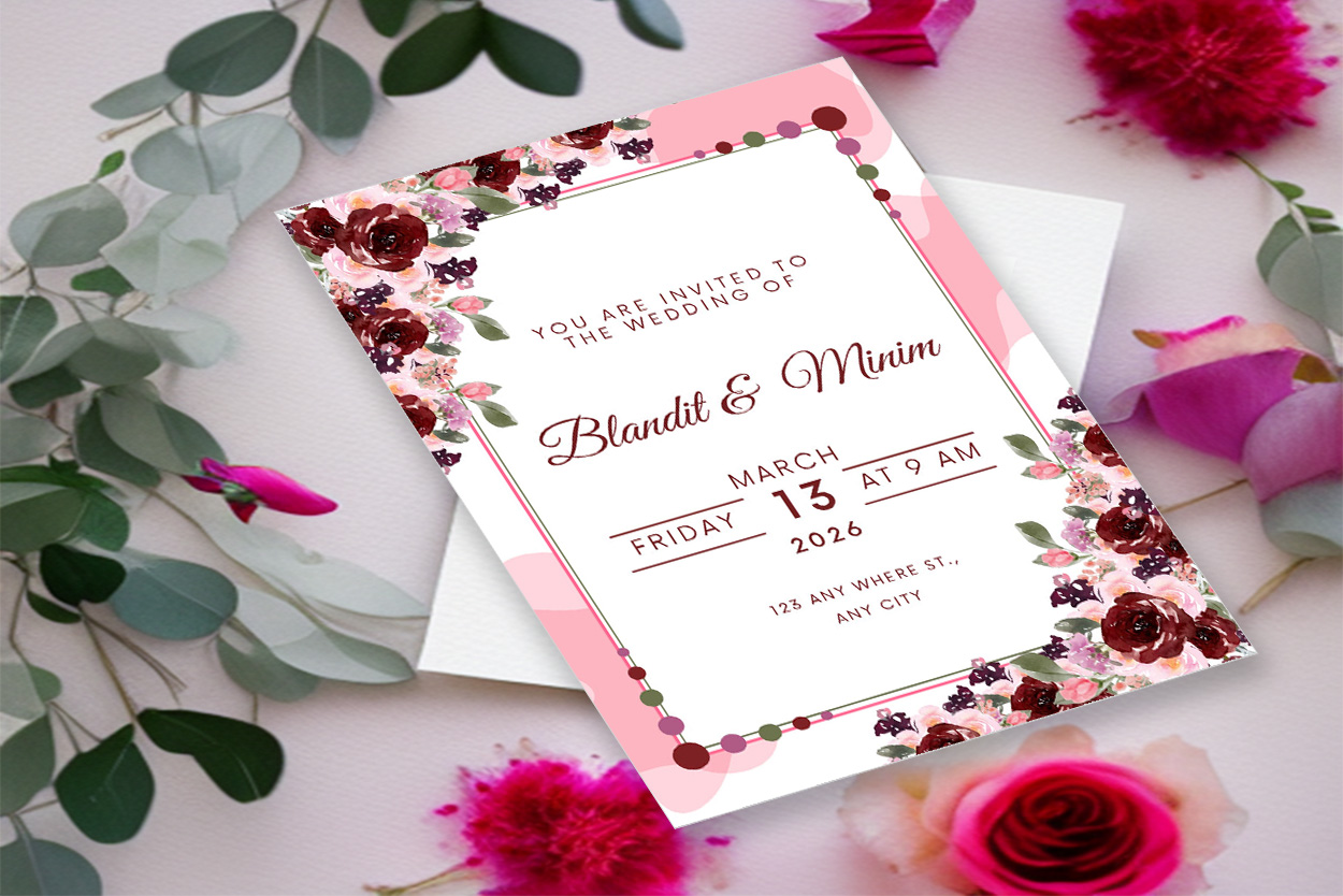 Image of a gorgeous pink wedding invitation with flowers.