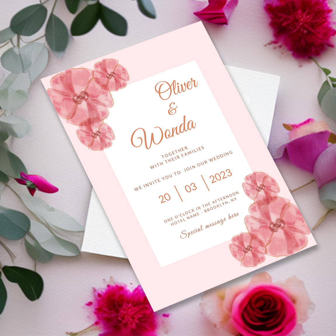 Image with amazing wedding invitation card in pink colors and flowers.