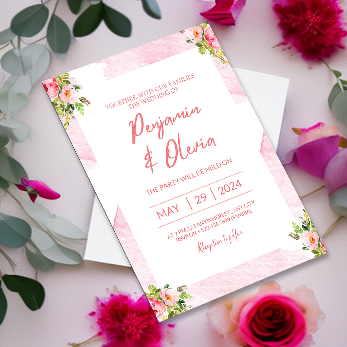 Image with charming wedding invitation in gold and pink tones with flowers.