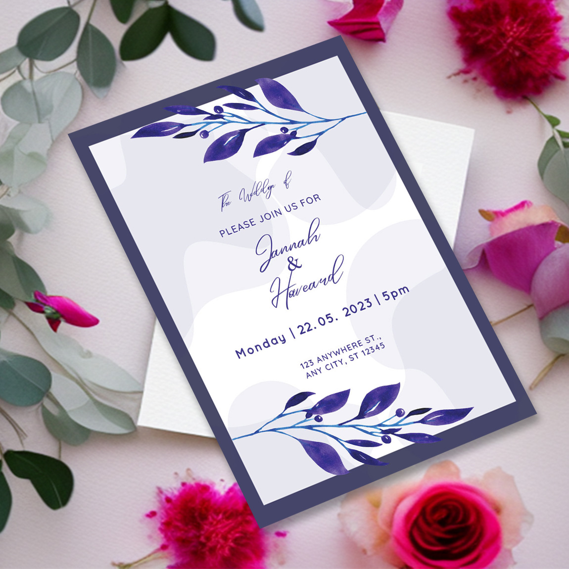 Image with irresistible wedding invitation in blue tones and leaves.