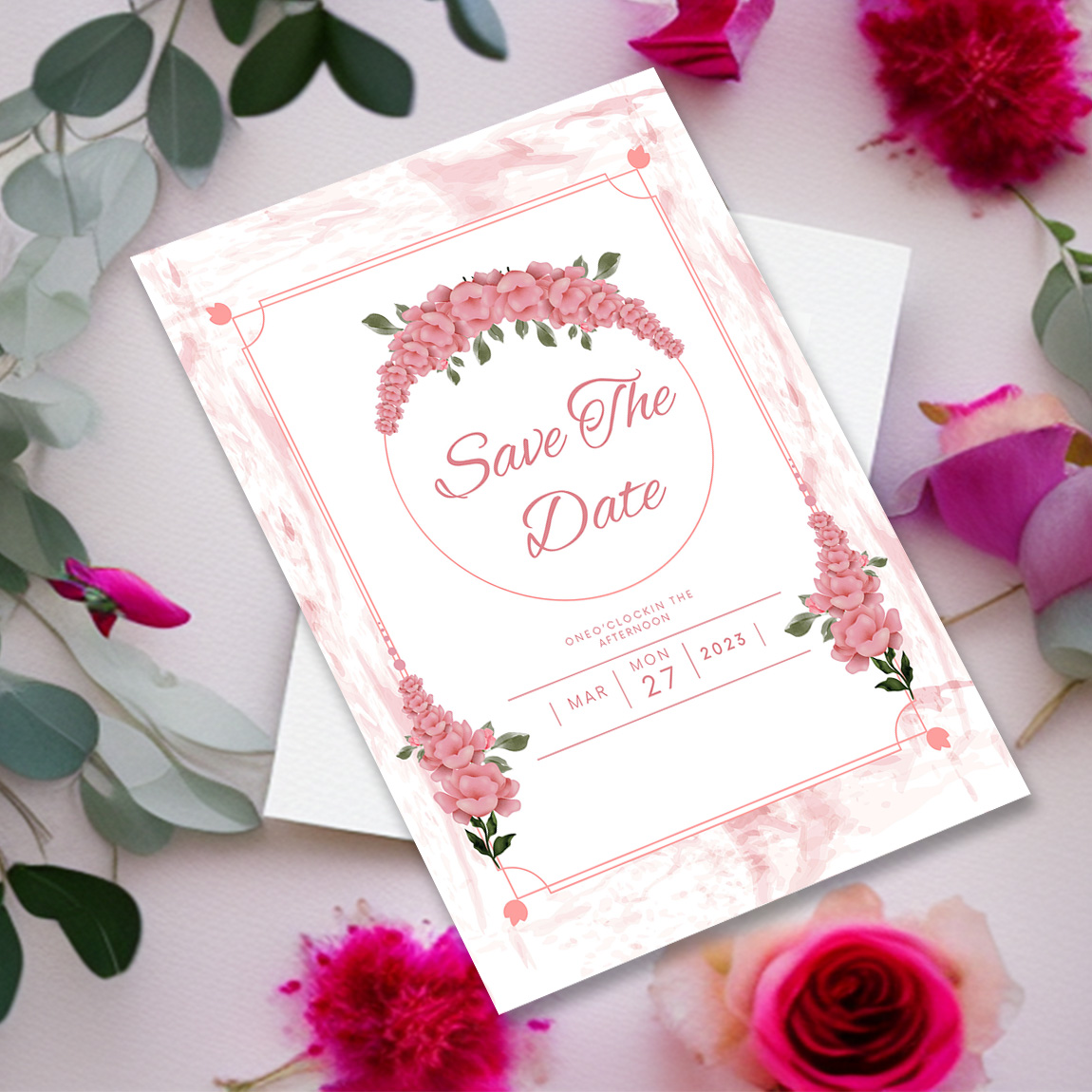 Image with irresistible wedding invitation card in pink tones and flowers.