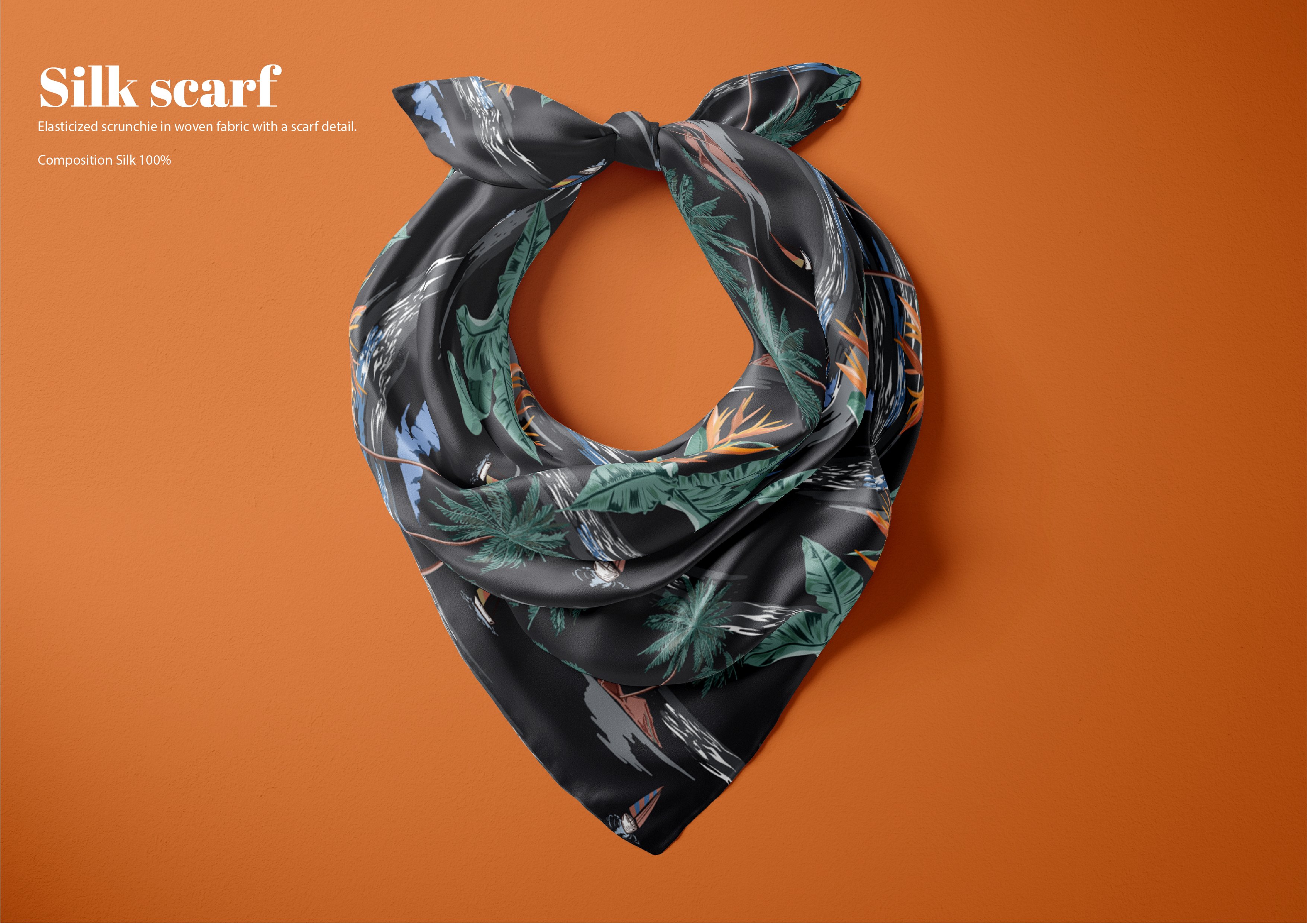 Black silk scarf with a green leaves.