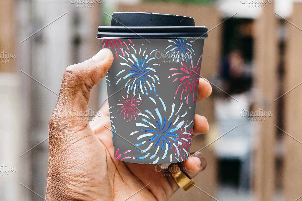 Cup of coffee with pattern of fireworks.