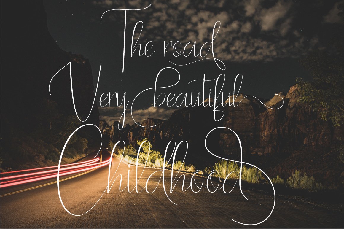White lettering "The road very beautiful Childhood" on the night road image.